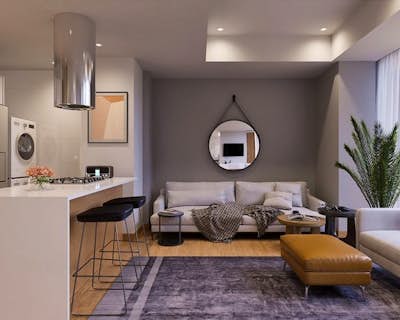 una moderna sala de estar con muebles, gabinetes brillantes