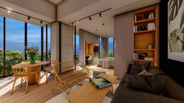 una sala de estar con buena ventilación natural, grandes ventanales, muebles