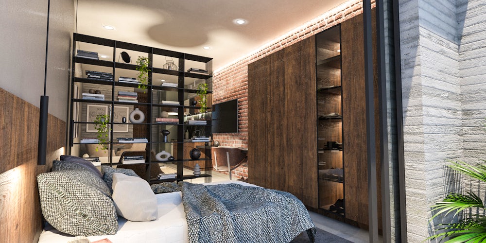 un dormitorio con espacio en el armario, buena ventilación natural, puerta de madera